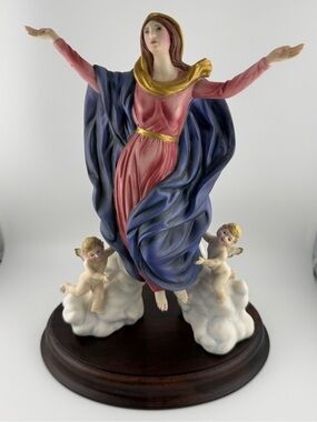 Porcelain figurine The Assumption of Mary from the Franklin Mint.